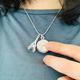 To activate it, you just have to press the charm twice.